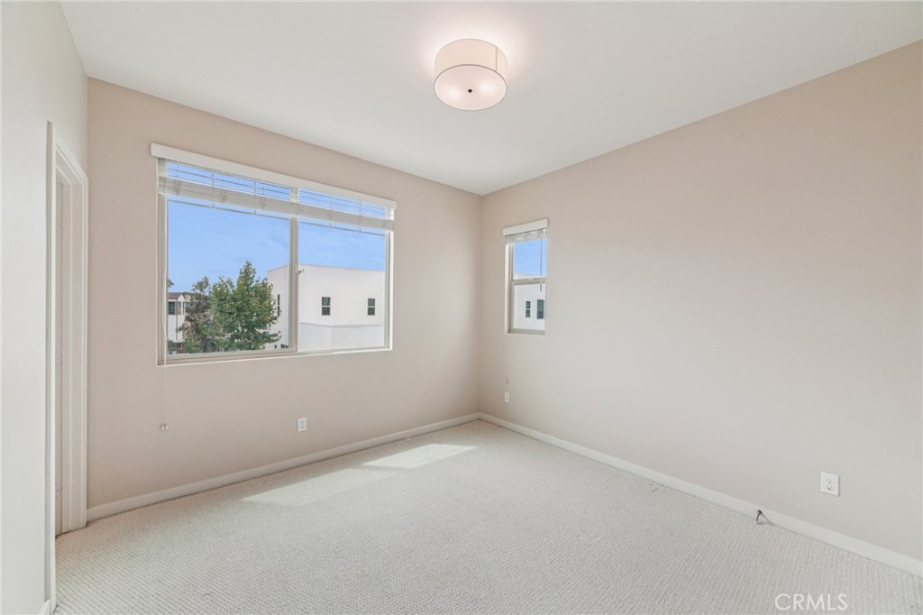 143 Frame Irvine, CA 92618 - Photo 17 of 41 an empty room with a window