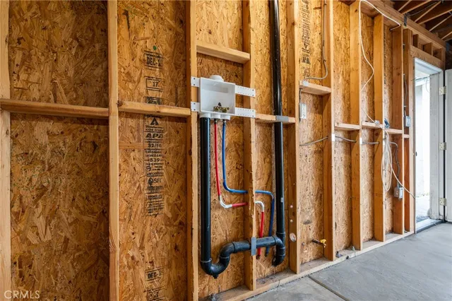 a tree in a backyard of a house