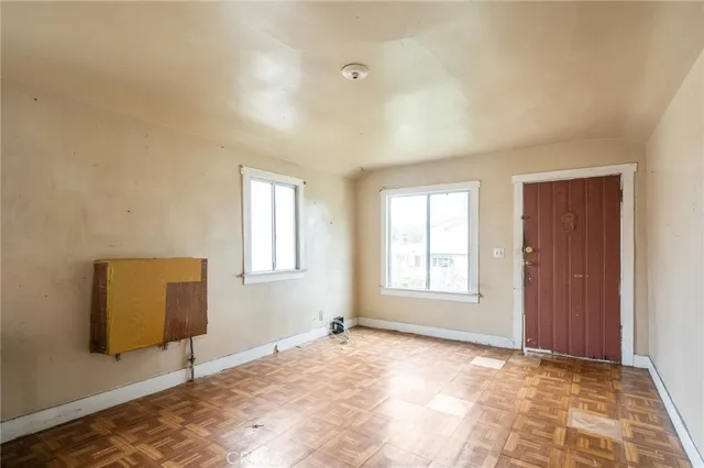 a view of an empty room and window