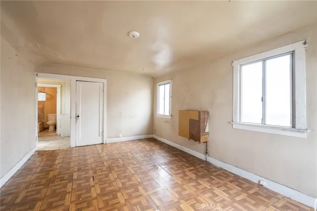 a view of an empty room and window