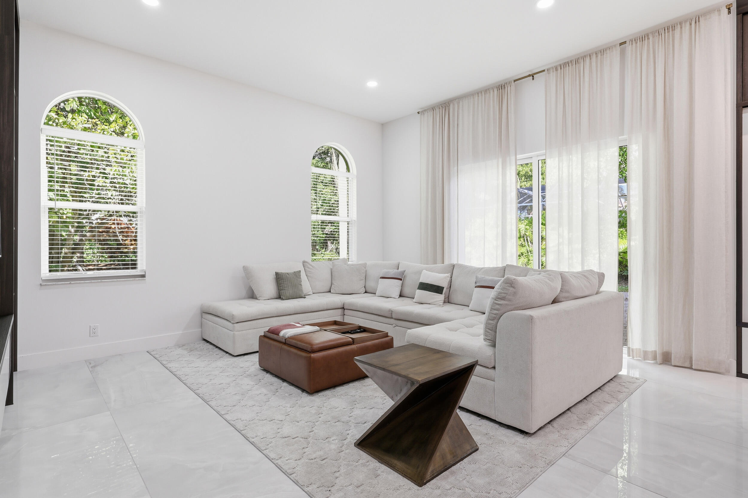 12363 Clearfalls Drive Boca Raton, FL 33428 - Photo 17 of 58 a living room with furniture and a window