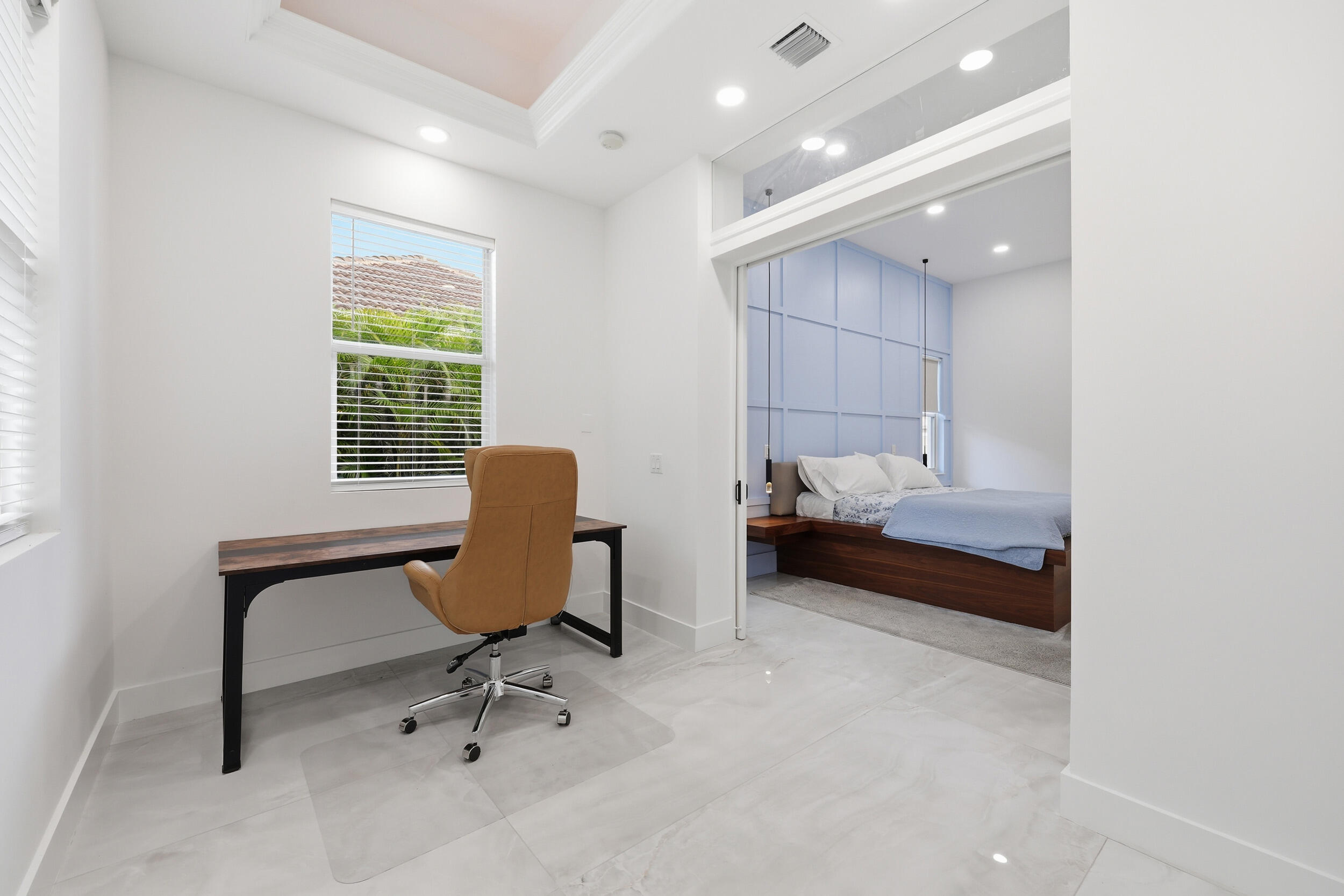 12363 Clearfalls Drive Boca Raton, FL 33428 - Photo 21 of 58 a bedroom with furniture and a window