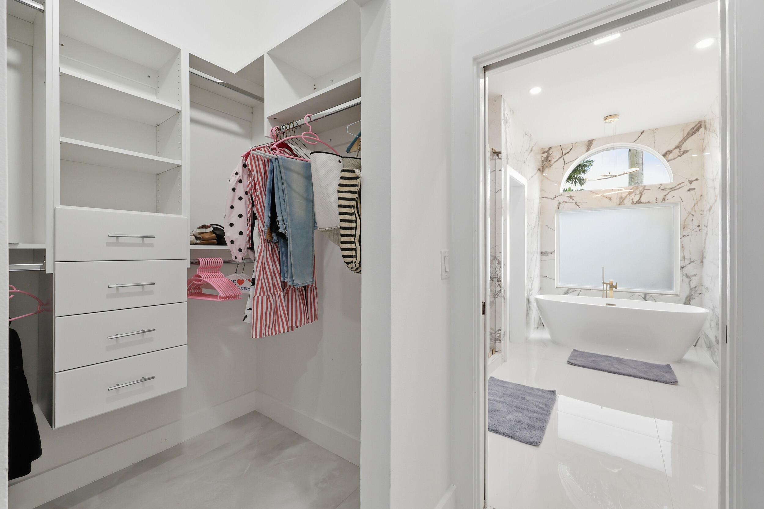 12363 Clearfalls Drive Boca Raton, FL 33428 - Photo 24 of 58 a view of a walk in closet