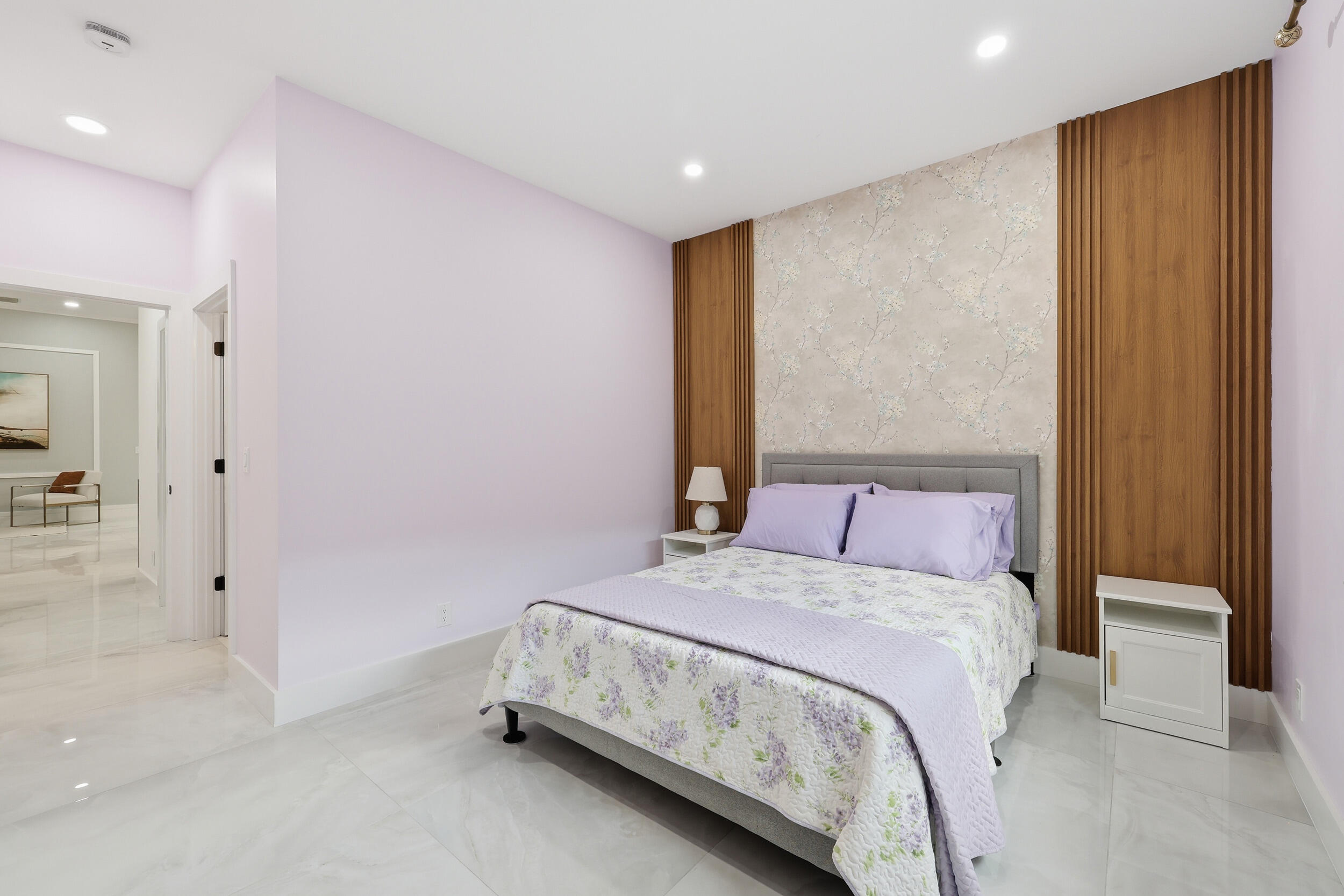 12363 Clearfalls Drive Boca Raton, FL 33428 - Photo 29 of 58 a bedroom with a bed and a table