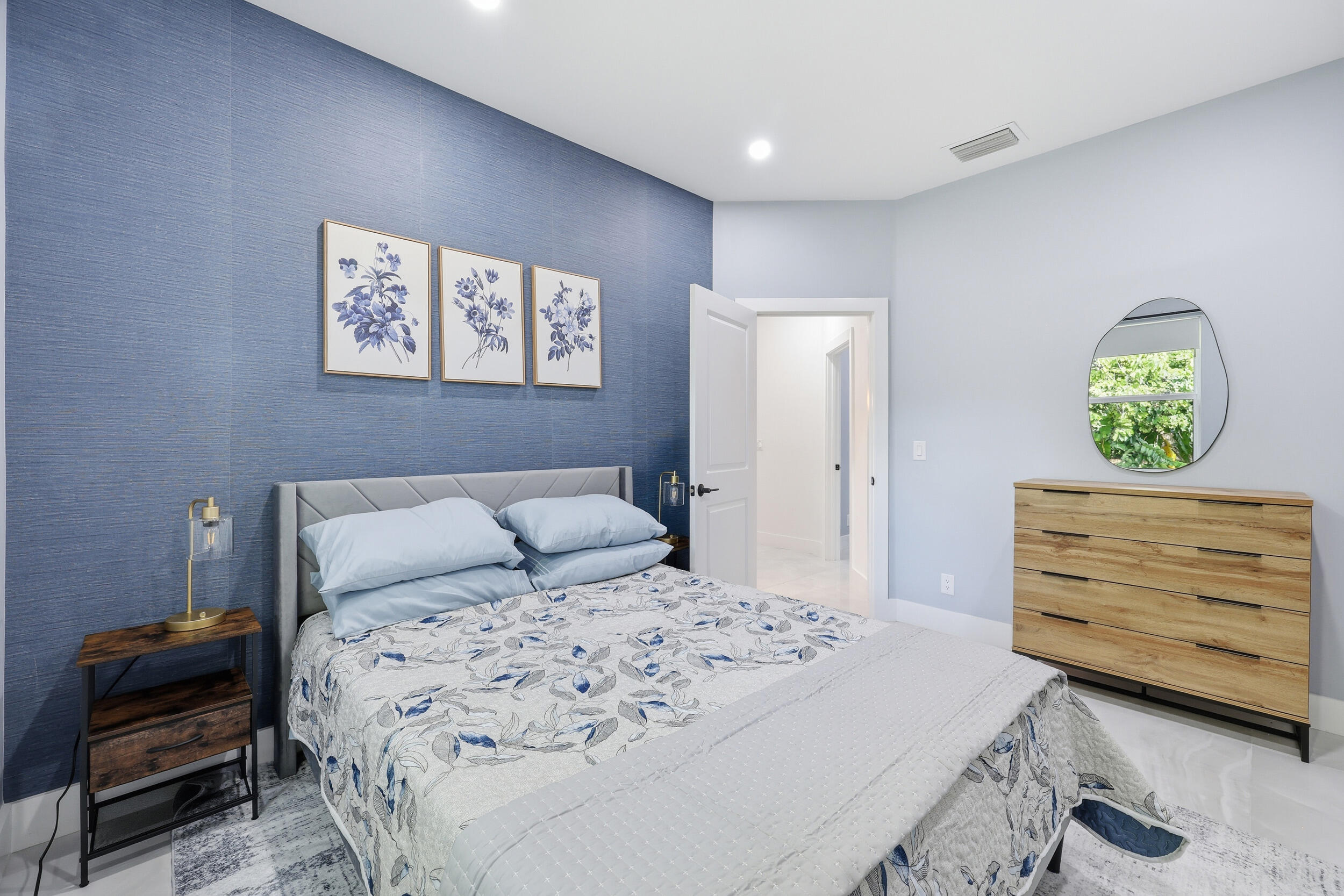 12363 Clearfalls Drive Boca Raton, FL 33428 - Photo 33 of 58 a bedroom with a bed and a couch