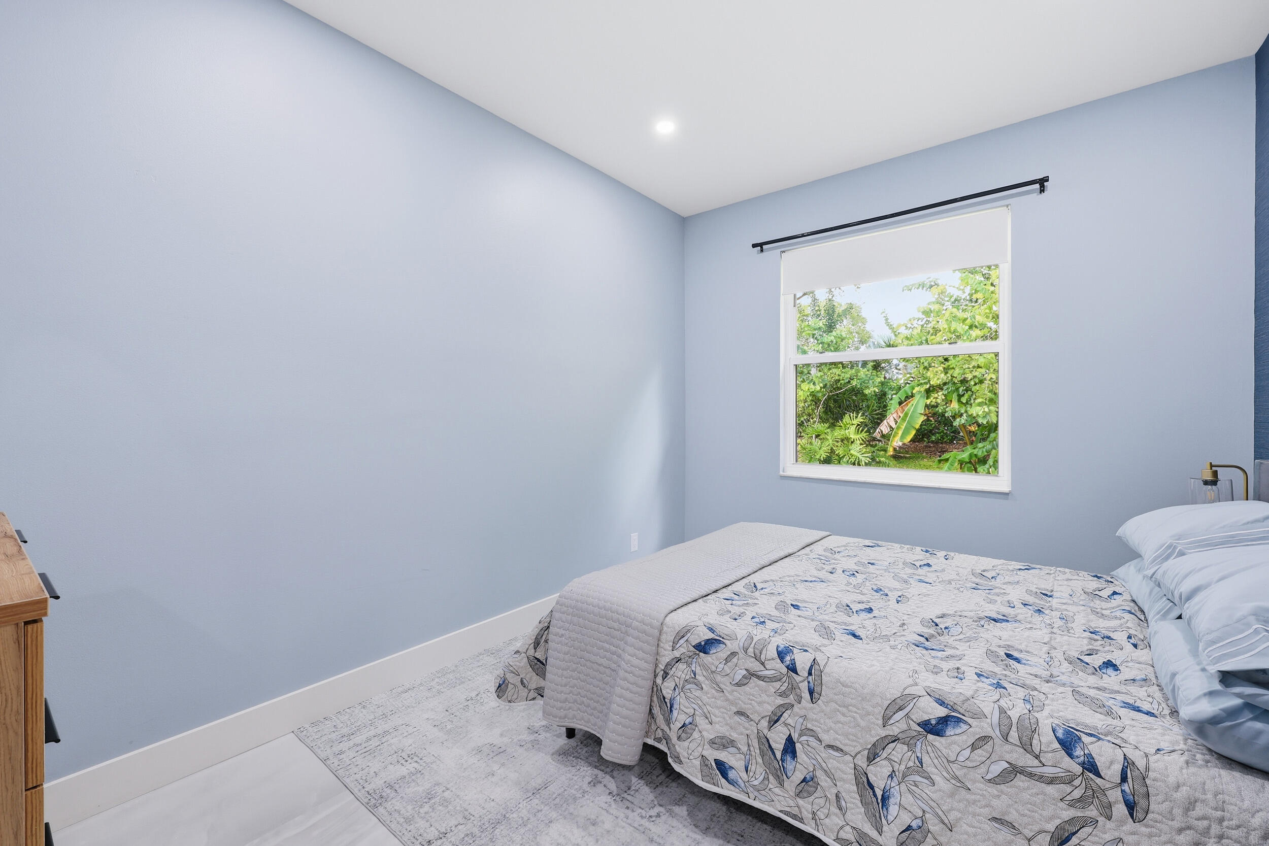 12363 Clearfalls Drive Boca Raton, FL 33428 - Photo 34 of 58 a bedroom with a bed and a window