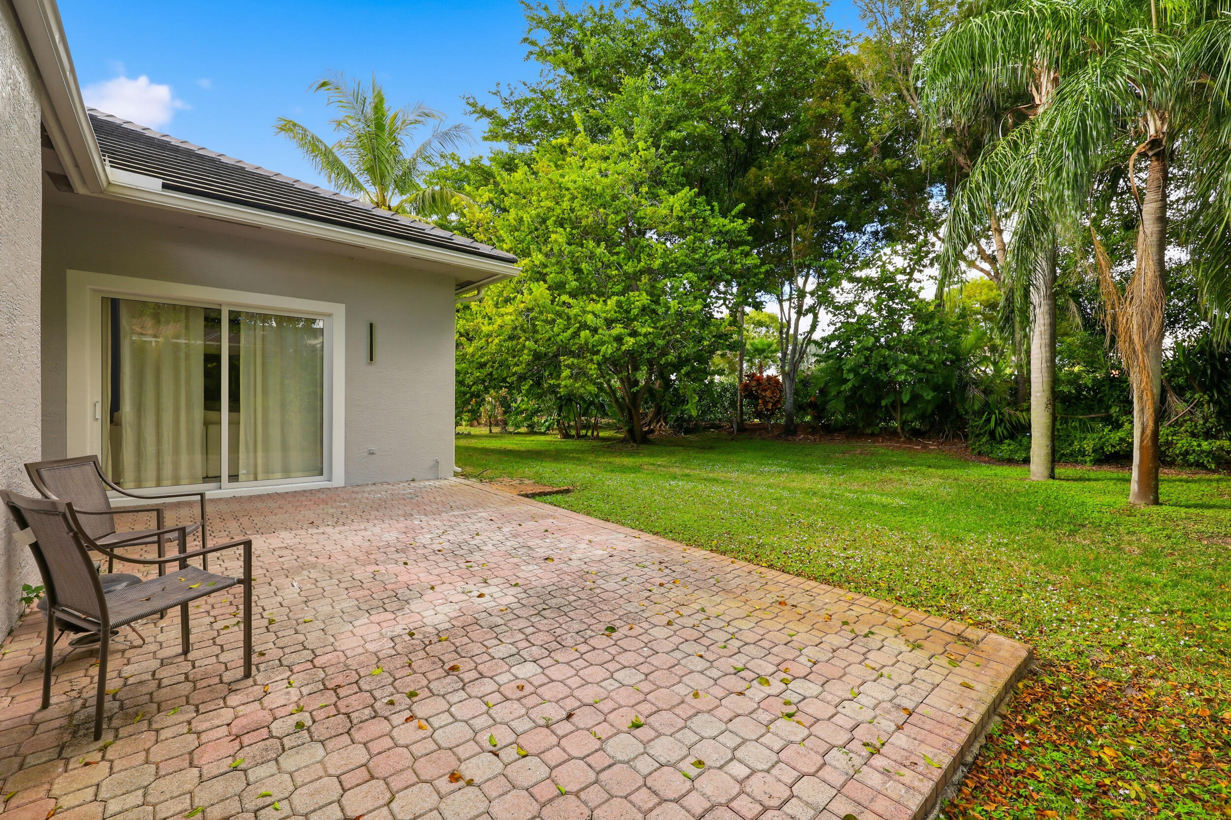 12363 Clearfalls Drive Boca Raton, FL 33428 - Photo 41 of 58 a view of a house with backyard and garden