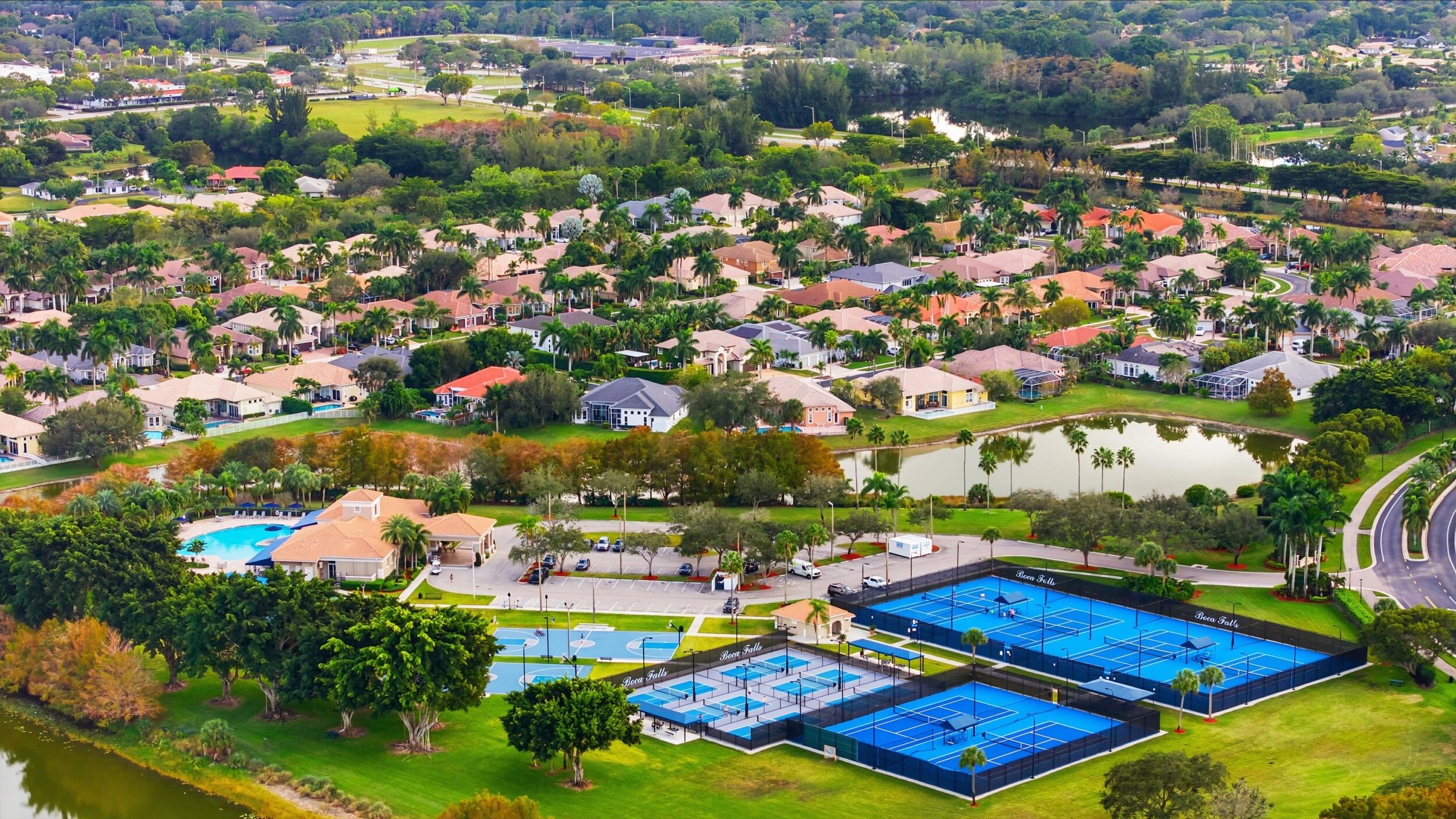 12363 Clearfalls Drive Boca Raton, FL 33428 - Photo 44 of 58 an outdoor space with swimming pool and lake view
