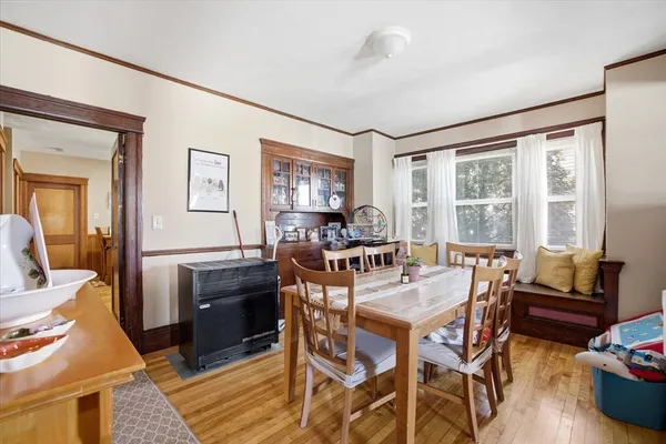 a view of a dining room with furniture window and outside view