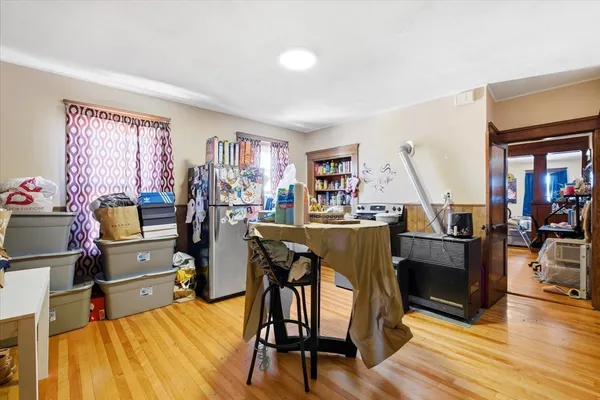 a view of a livingroom with furniture and a flat screen tv
