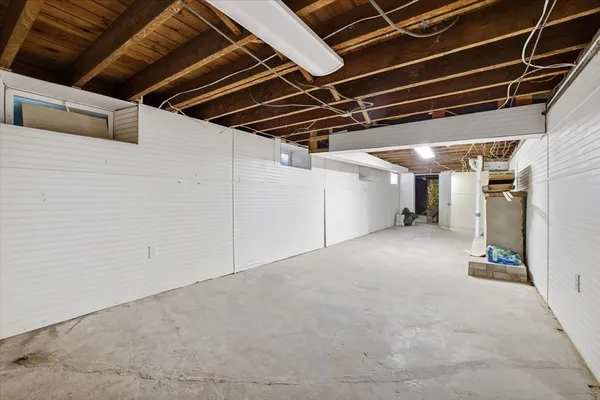 a view of empty room with painted walls