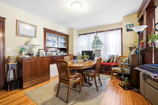 a view of a dining room with furniture window and outside view