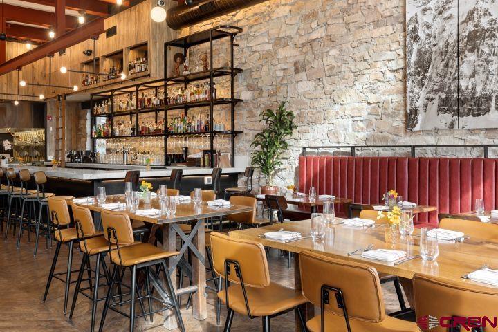 185 North Lena Street Ridgway, CO 81432 - Photo 14 of 20 a view of a dinning table and chairs in the patio