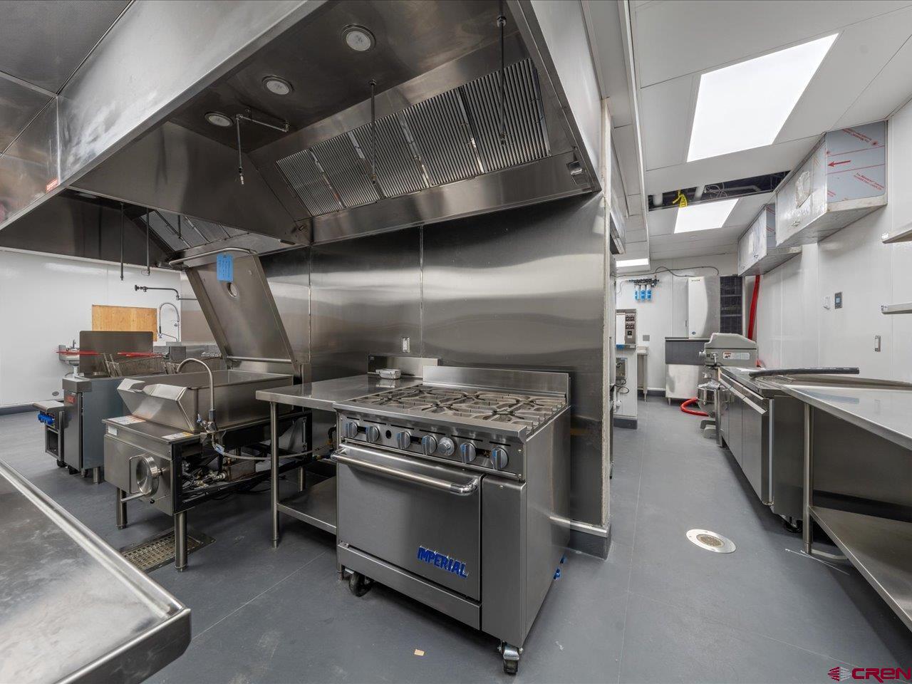 185 North Lena Street Ridgway, CO 81432 - Photo 18 of 20 a stove top oven sitting inside of a kitchen