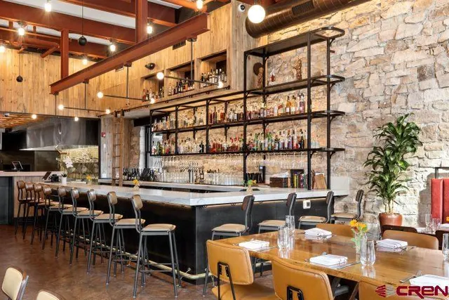 a view of a kitchen with lots of counter top space