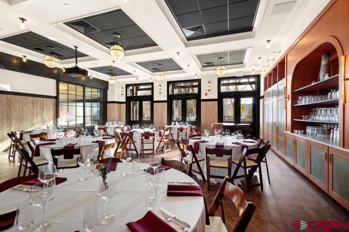 185 North Lena Street Ridgway, CO 81432 - Photo 9 of 20 a room with lots of tables and chairs