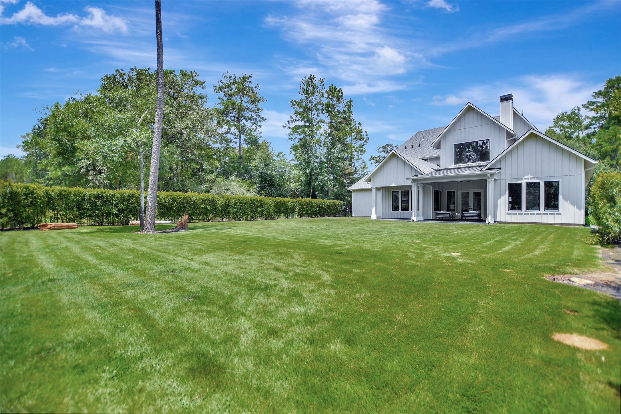 411 Copa Palm Loop Montgomery, TX 77316 - Photo 44 of 46 a front view of a house with garden