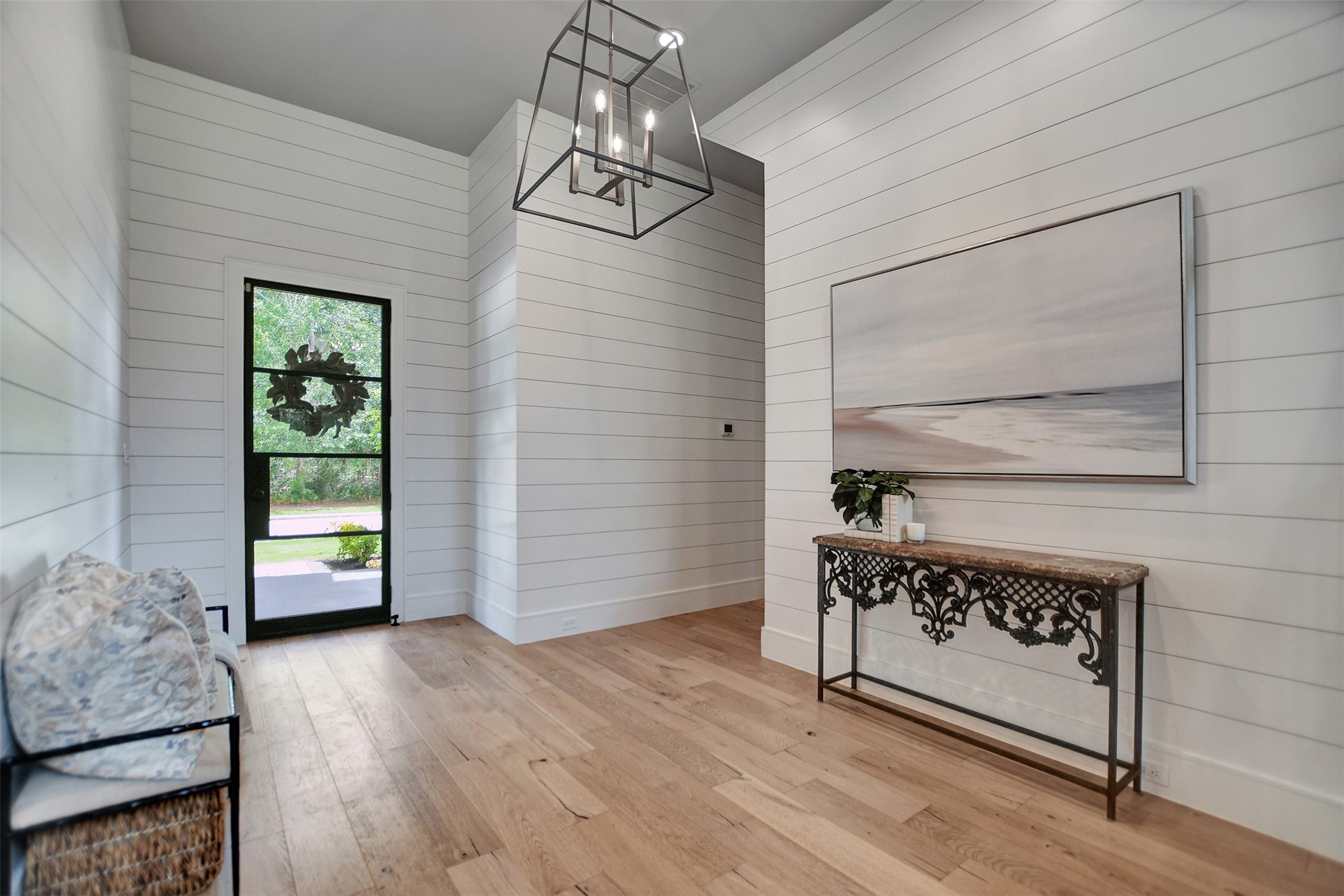 411 Copa Palm Loop Montgomery, TX 77316 - Photo 5 of 46 a view of a hallway with wooden floor and a stairs