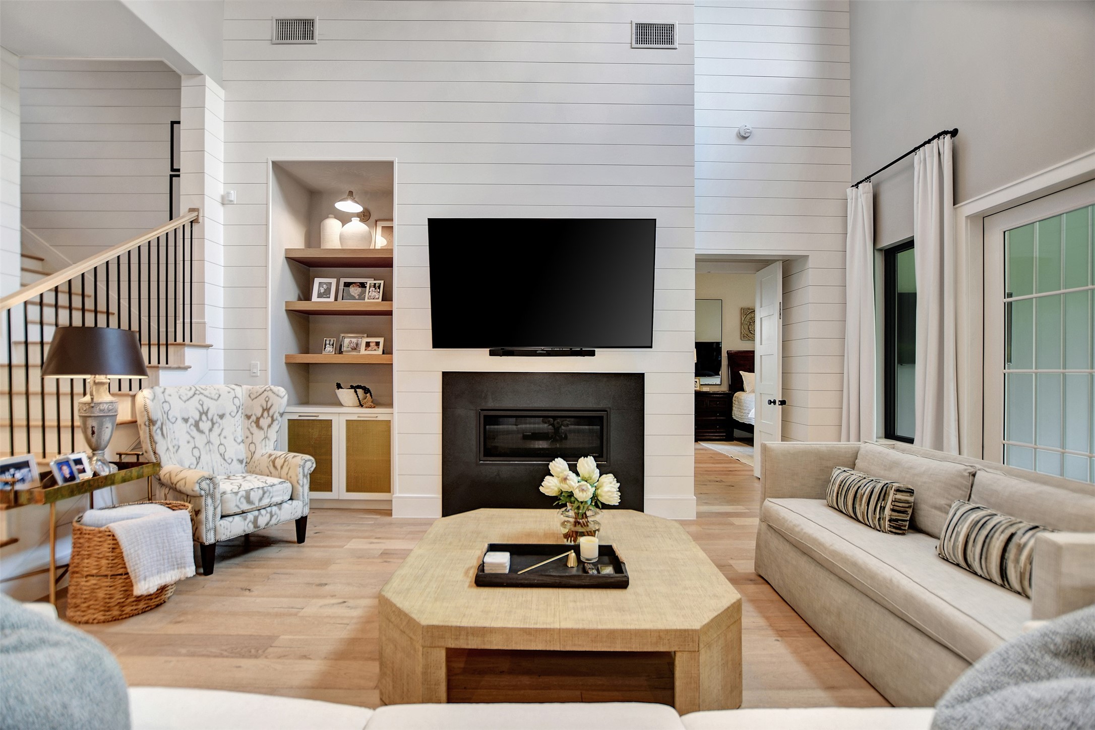 411 Copa Palm Loop Montgomery, TX 77316 - Photo 9 of 46 a living room with furniture a fireplace and a flat screen tv