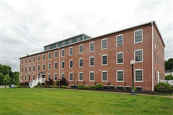 25 Cedar Street, Unit 3 Amesbury, MA 01913 - Photo 13 of 13 a large building with a yard