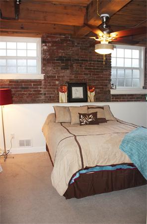 25 Cedar Street, Unit 3 Amesbury, MA 01913 - Photo 5 of 13 a bedroom with a bed and window