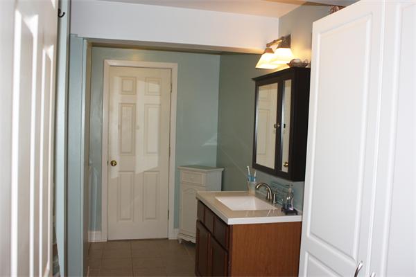 25 Cedar Street, Unit 3 Amesbury, MA 01913 - Photo 7 of 13 a bathroom with a sink and a mirror