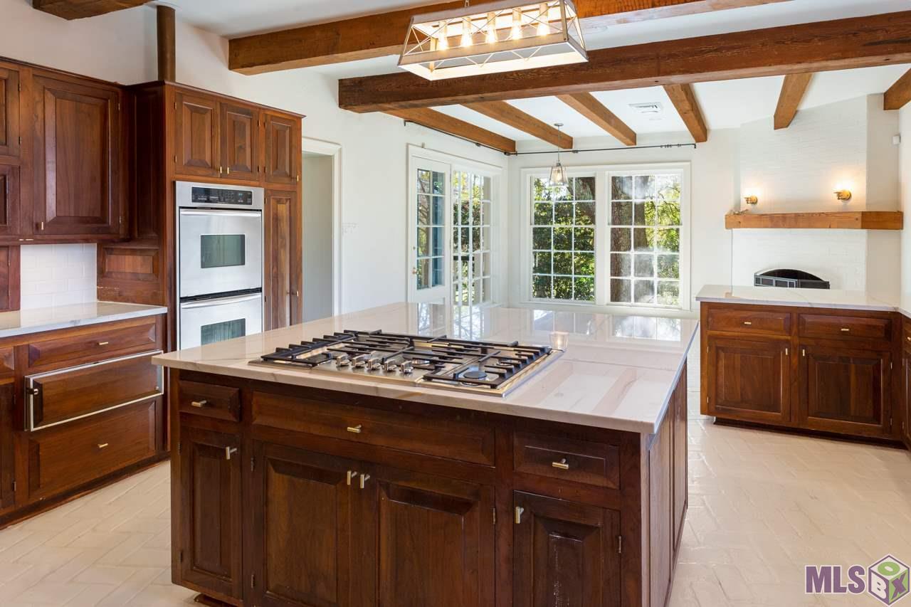 4756 Highland Road Baton Rouge, LA 70808 - Photo 7 of 42 Recent Kitchen Update Includes Quartzite Countertops Subway Tile and Bosch Appliances