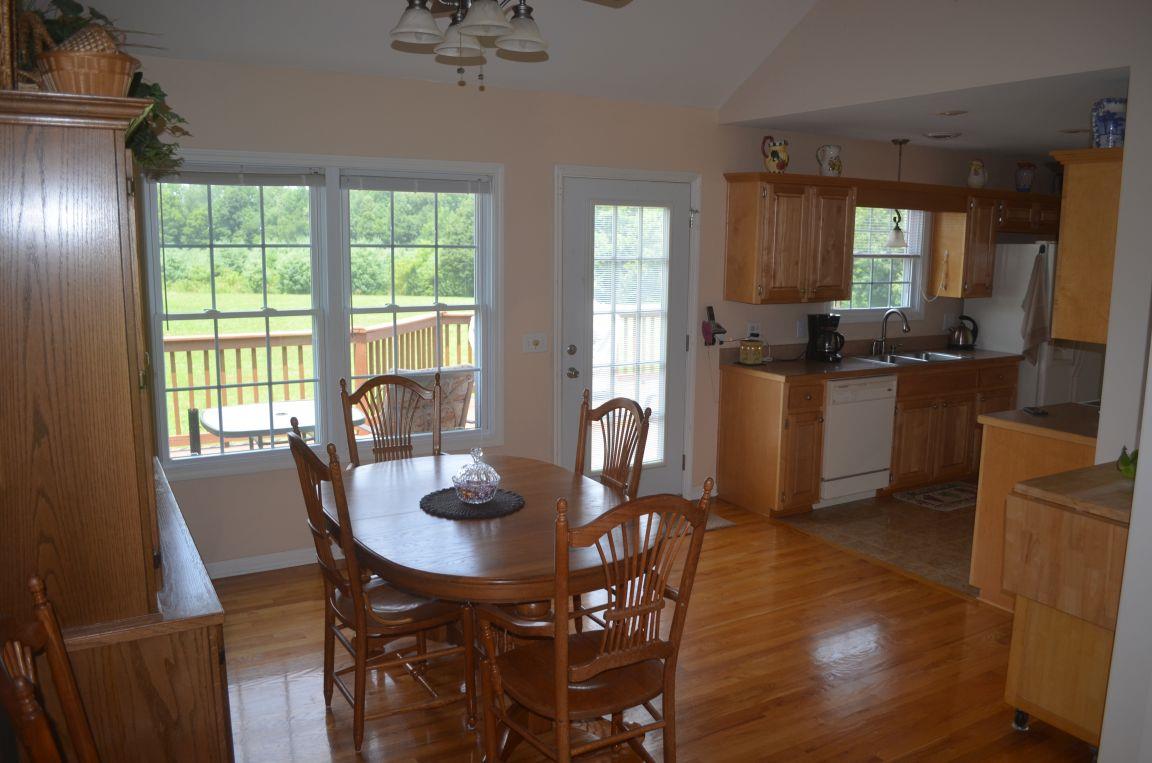 2790 Woods Road Springfield, TN 37172 - Photo 6 of 30 a view of a dining room with furniture window and wooden floor