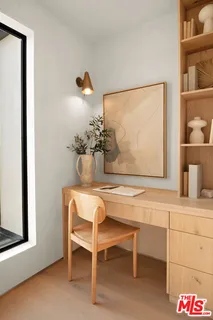 a view of dining room and wooden floor
