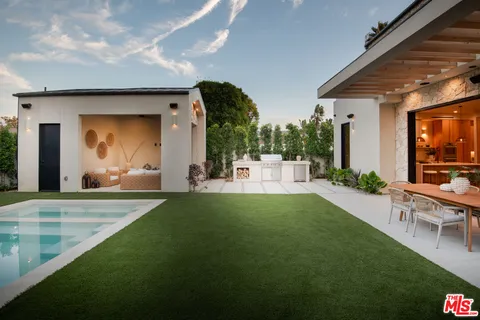 a view of a house with entertaining space