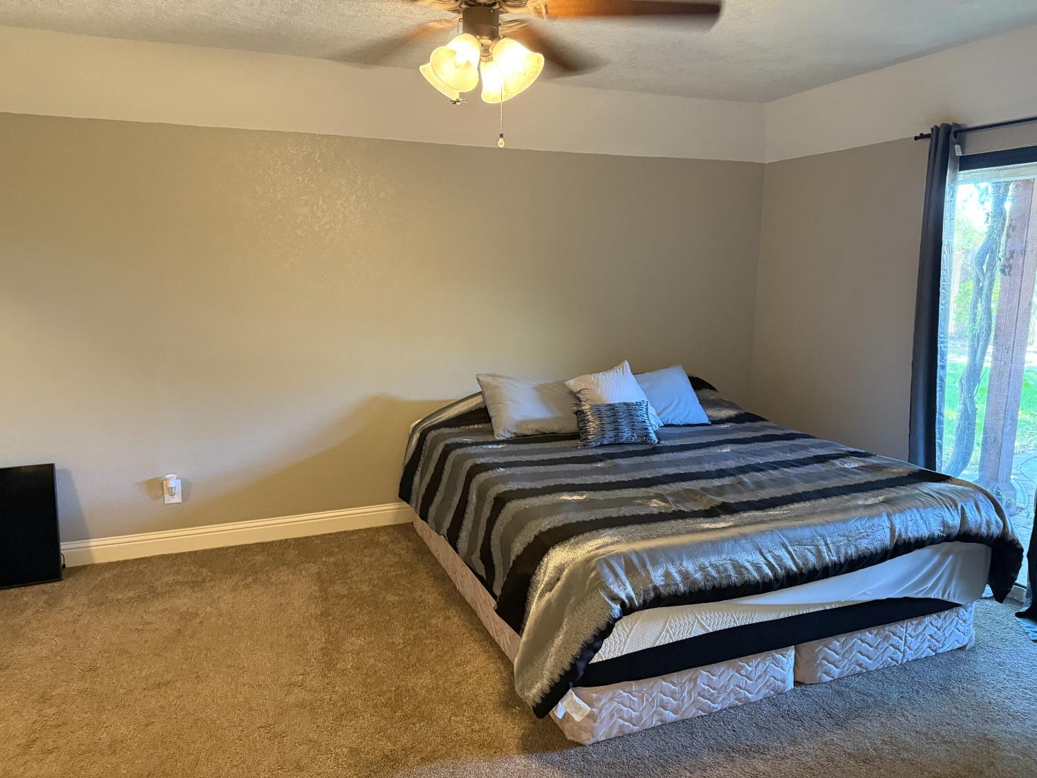 60 Phillip Avenue Clovis, CA 93612 - Photo 9 of 17 a bedroom with a bed and window