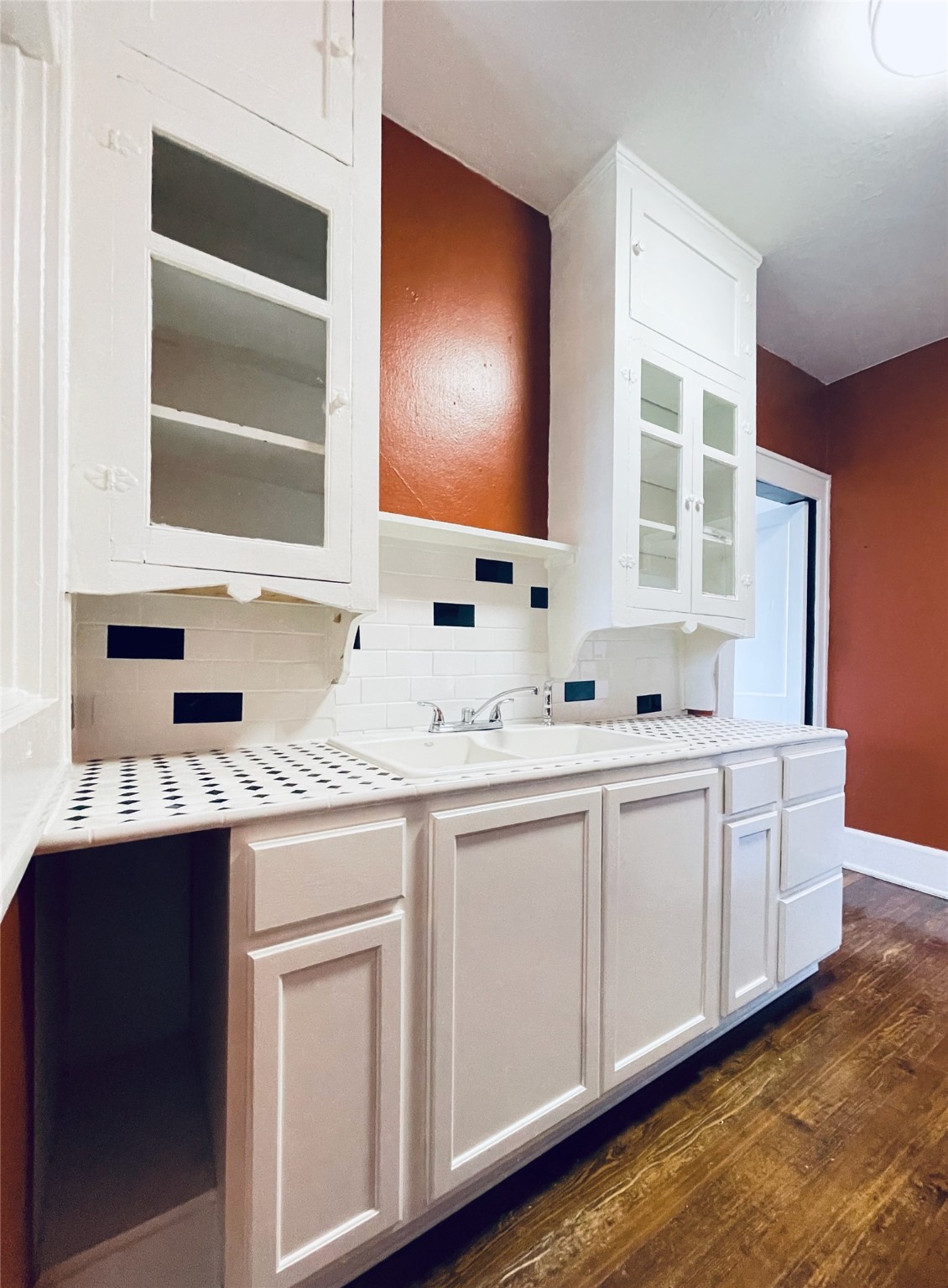 614 Peden Street, Unit B Houston, TX 77006 - Photo 5 of 11 a bathroom with a double vanity sink and mirror