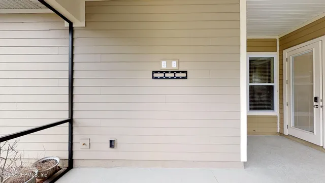 a view of a door and a window