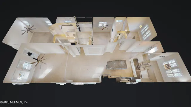 a white house with a black umbrella