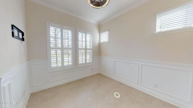 an empty room with windows