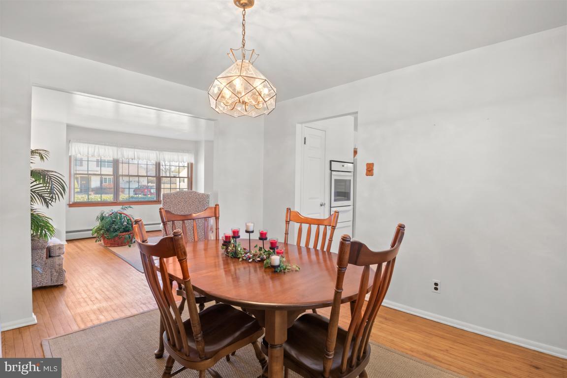 1538 Windmill Road Warminster, PA 18974 - Photo 12 of 32 Hardwood floor in dining room