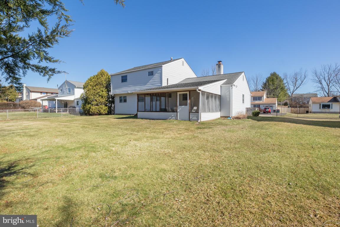 1538 Windmill Road Warminster, PA 18974 - Photo 31 of 32 a view of a house with a big yard and large trees