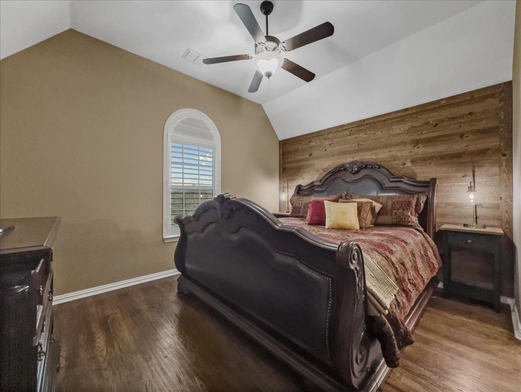 2832 Mona Vale Road Trophy Club, TX 76262 - Photo 30 of 37 a bedroom with a bed and a ceiling fan