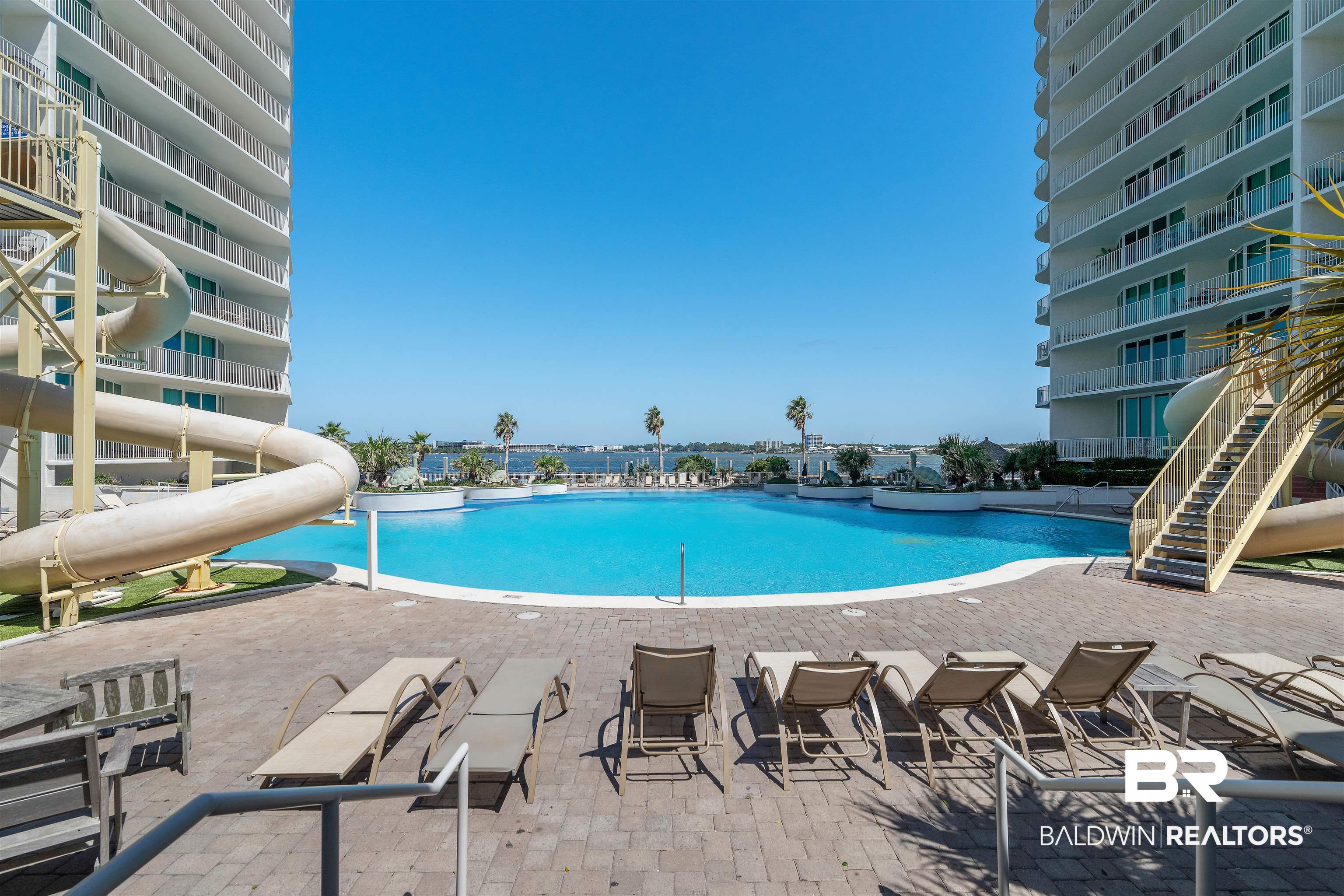 28107 Perdido Beach Boulevard, Unit DPH06 Orange Beach, AL 36561 - Photo 40 of 70 View of swimming pool featuring a patio area and a water slide