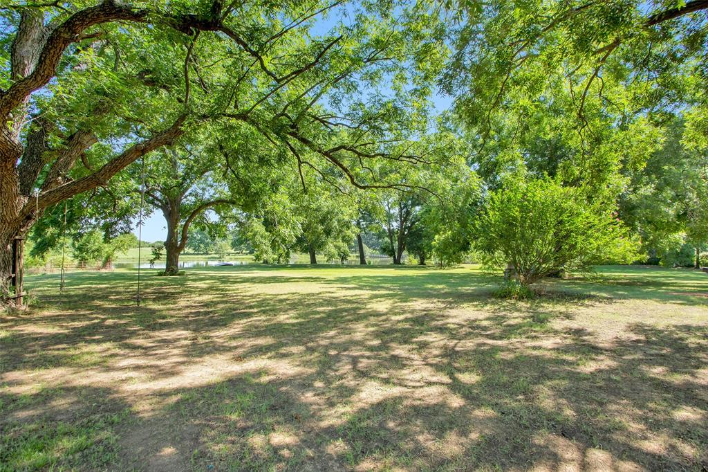 7146 Refuge Road Pottsboro, TX 75076 - Photo 12 of 39 a view of a field with trees