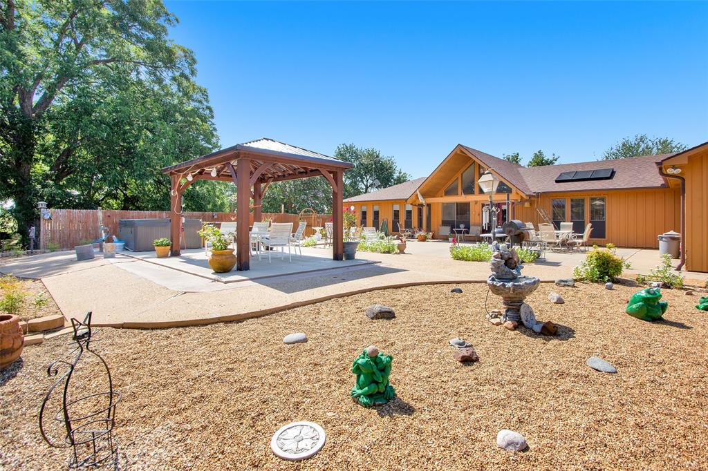 7146 Refuge Road Pottsboro, TX 75076 - Photo 2 of 39 a swimming pool with outdoor seating and yard