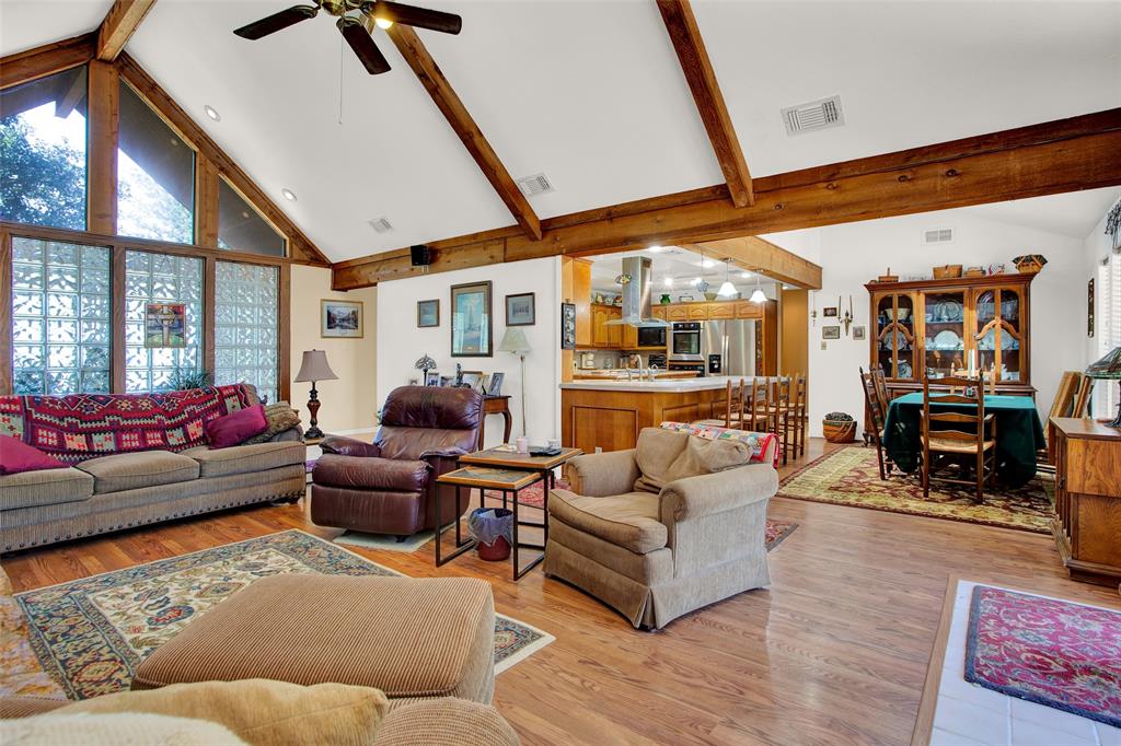 7146 Refuge Road Pottsboro, TX 75076 - Photo 23 of 39 a living room with furniture and wooden floor