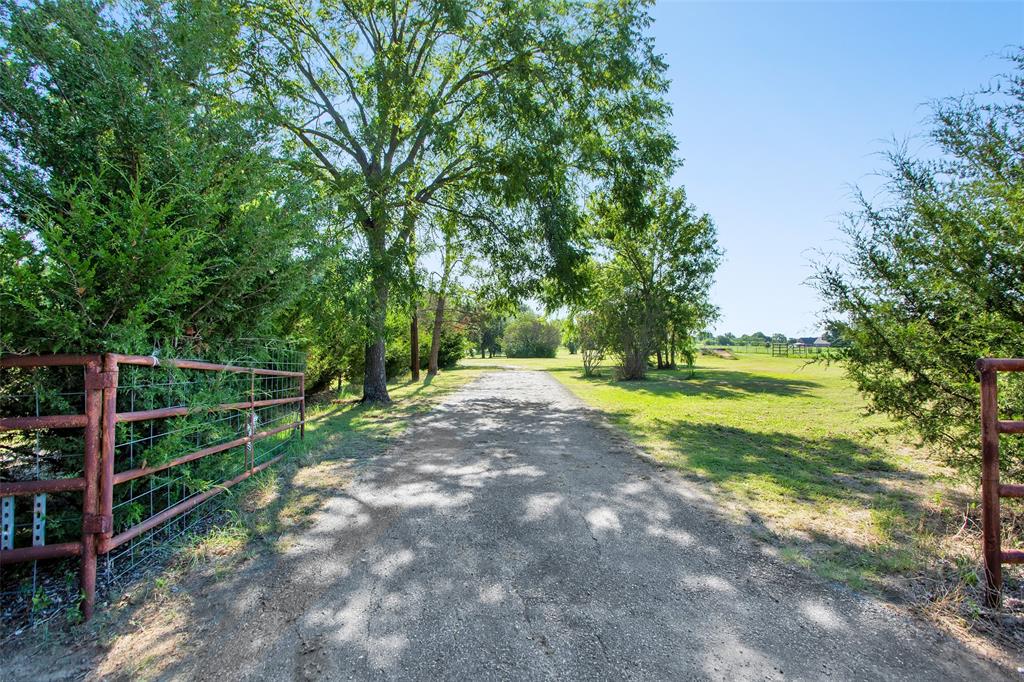 7146 Refuge Road Pottsboro, TX 75076 - Photo 7 of 39 a view of an outdoor space and yard