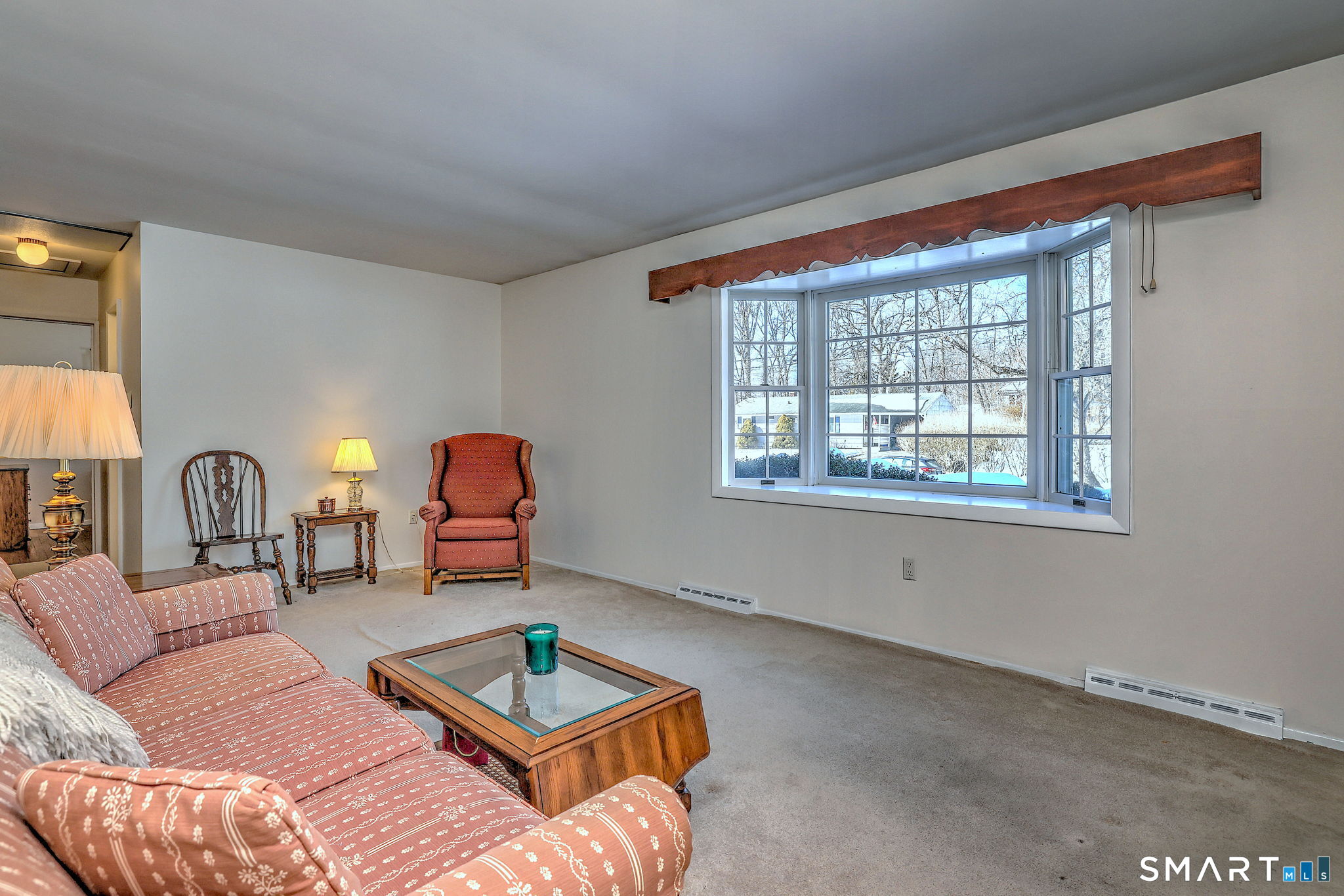 30 Crestview Terrace Wallingford, CT 06492 - Photo 1 of 32 a living room with furniture a rug and a window