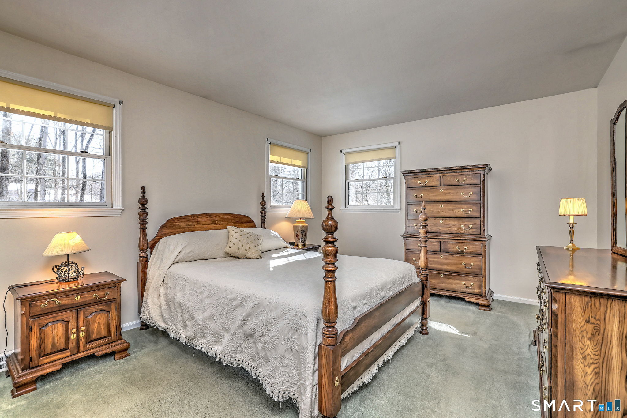 30 Crestview Terrace Wallingford, CT 06492 - Photo 19 of 32 a bedroom with a bed and a dresser