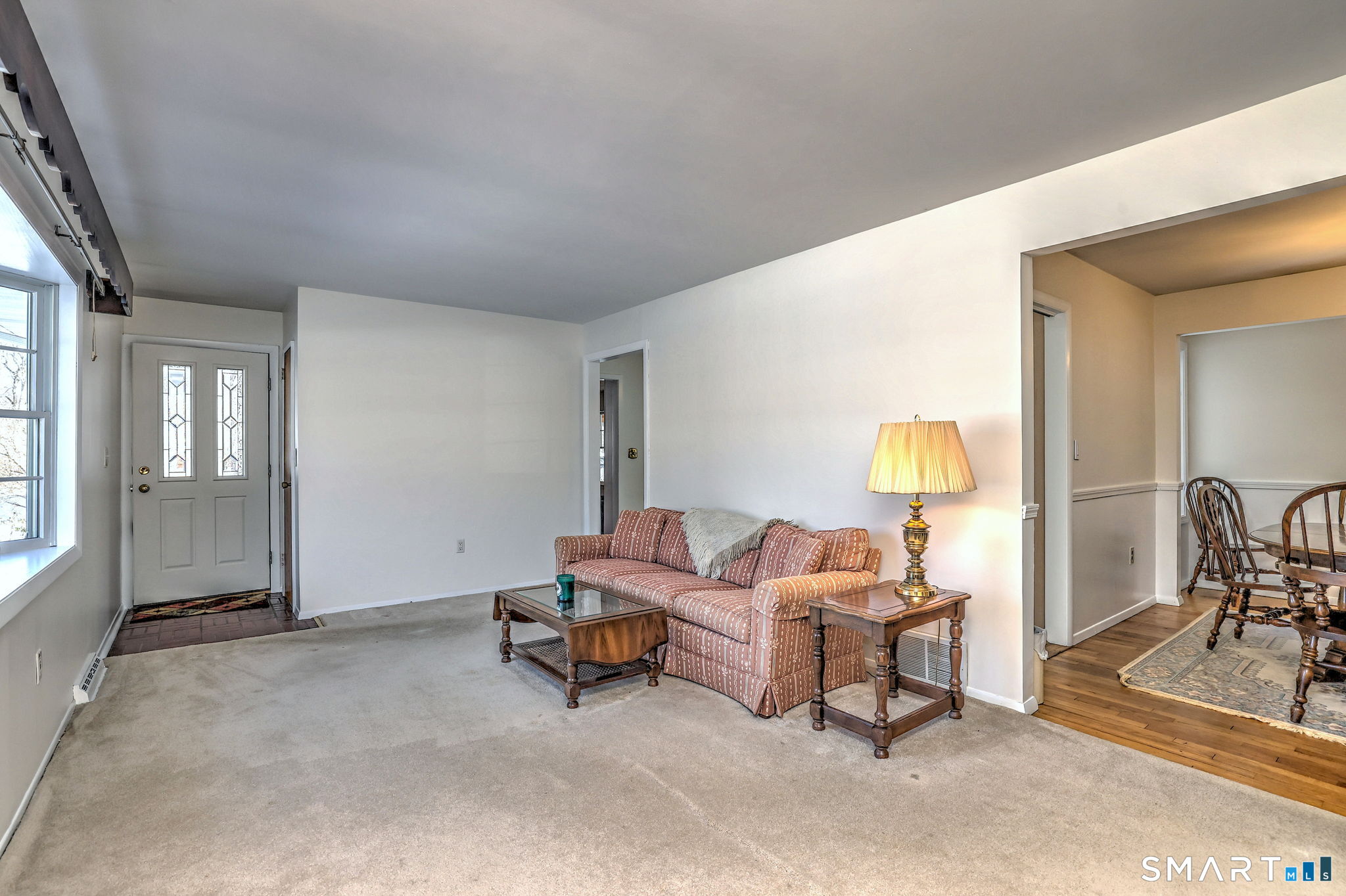 30 Crestview Terrace Wallingford, CT 06492 - Photo 2 of 32 a living room with furniture and a flat screen tv