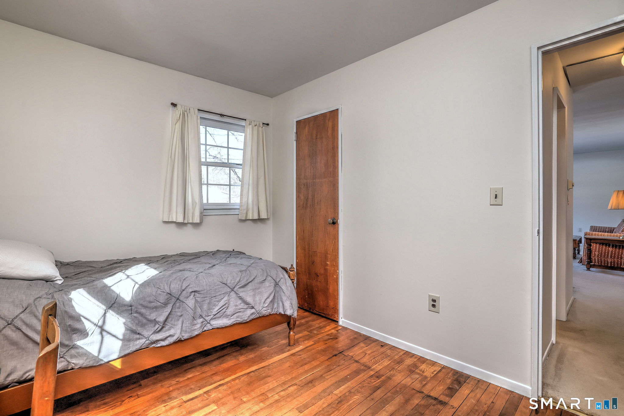 30 Crestview Terrace Wallingford, CT 06492 - Photo 24 of 32 a bedroom with a bed and a window