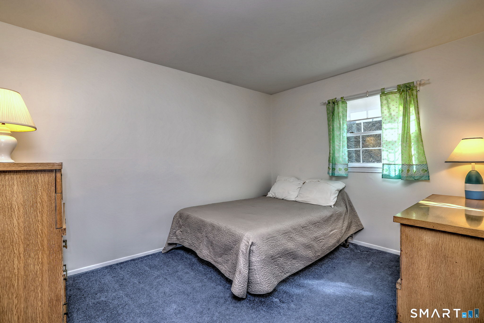 30 Crestview Terrace Wallingford, CT 06492 - Photo 26 of 32 a bedroom with a bed and a table