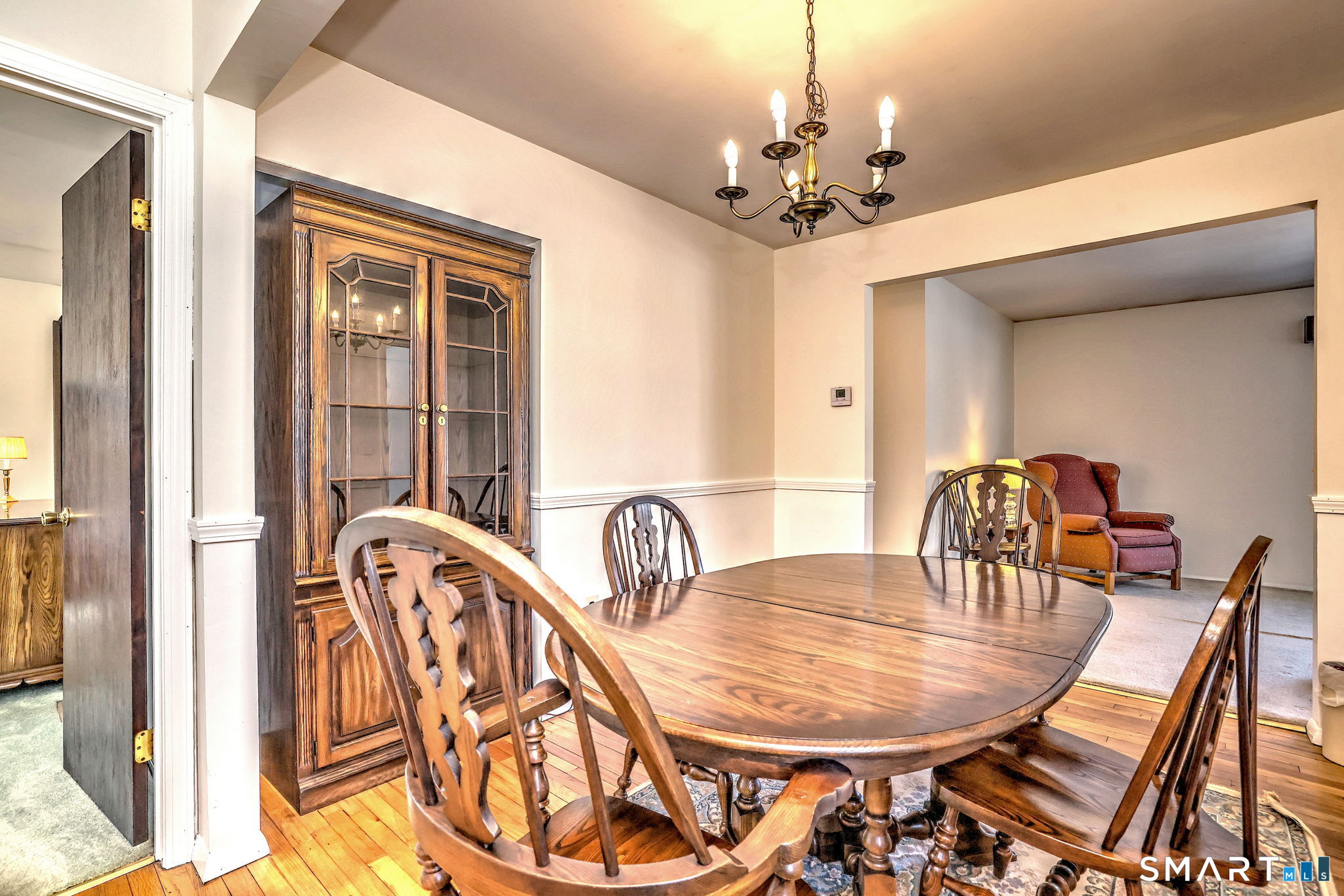 30 Crestview Terrace Wallingford, CT 06492 - Photo 4 of 32 a dining room with furniture and chandelier