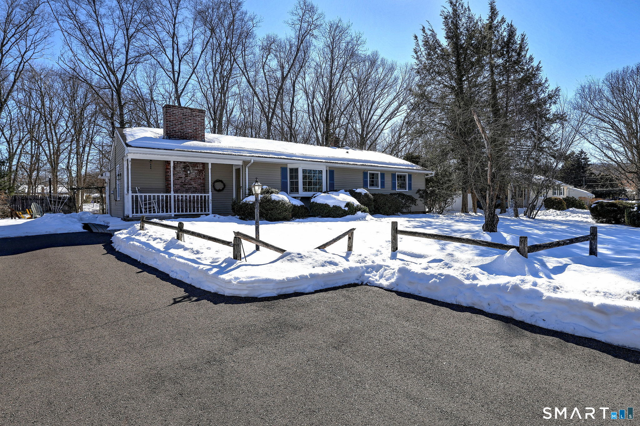 30 Crestview Terrace Wallingford, CT 06492 - Photo 5 of 32 a view of a patio with a table chairs and a fire pit